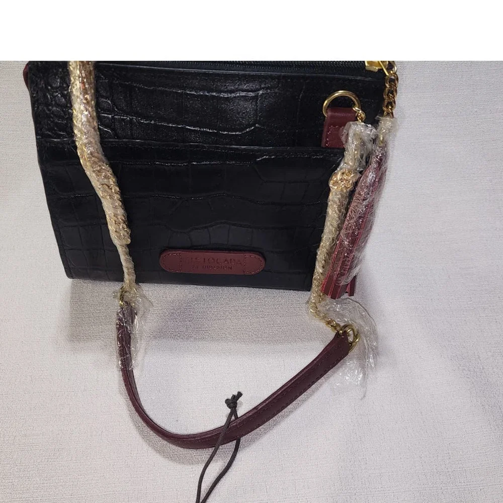 Isle Locada by Hidesign Women's light weigh crossbody handbag sling